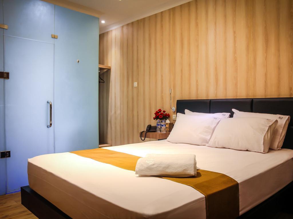 Madu Inn Jakarta Szoba fotó